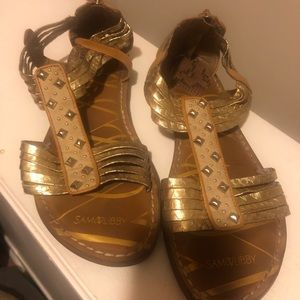 Brown and gold sandals